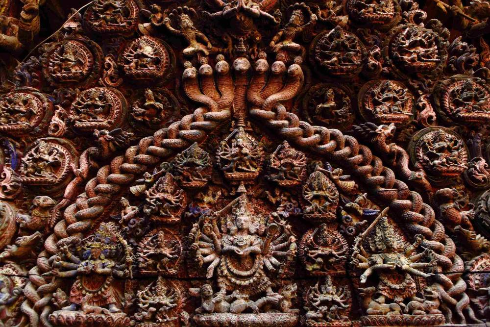 Hindu wood carving in Bhaktapur temple Nepal