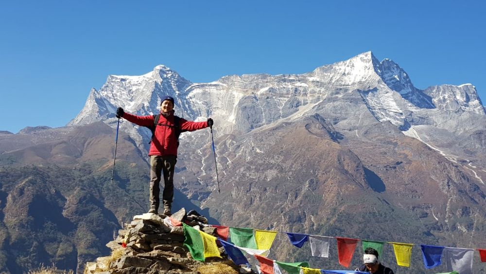 Trekkers enjoying the breathtaking sunrise at Gokyo Ri