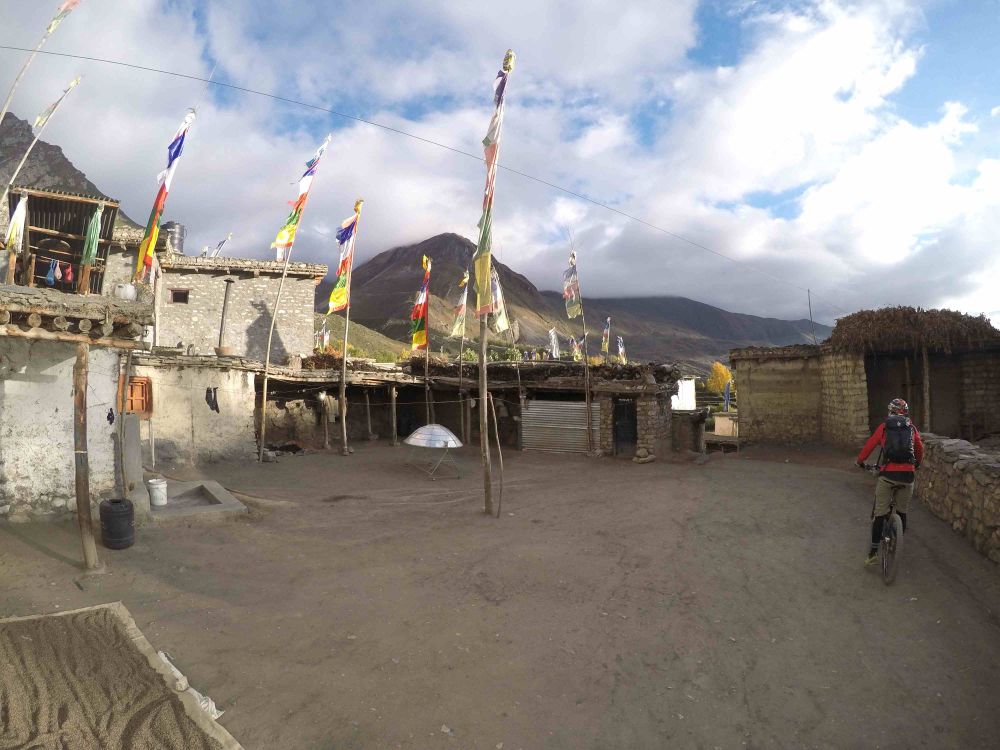 Mountain biker descending toward Muktinath